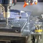 The operation of CNC machining centre cutting the mould parts
