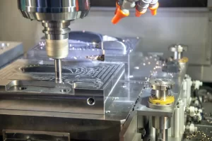 The operation of CNC machining centre cutting the mould parts